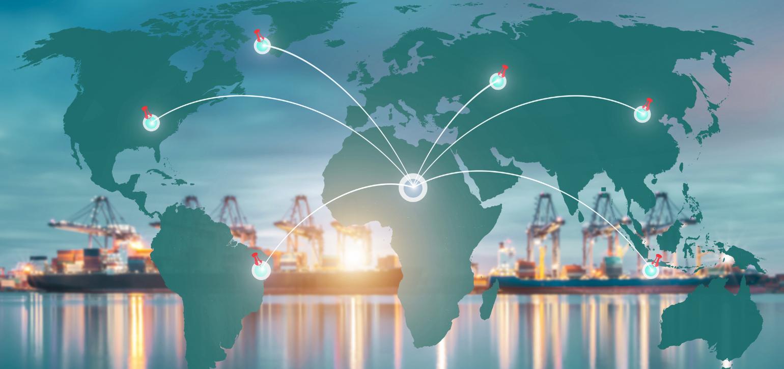 world map with sunset skyline behind