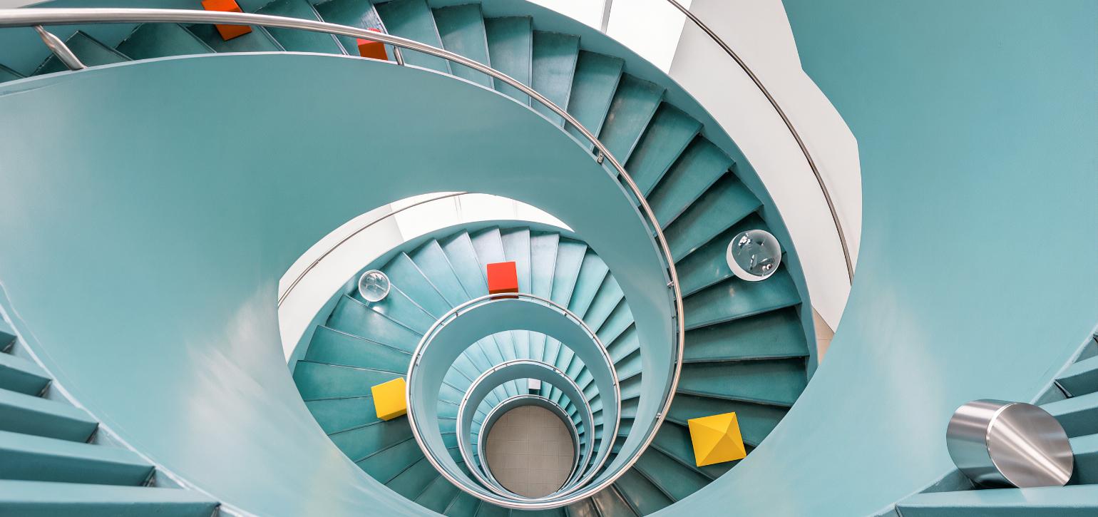 spiral staircase with coloured shapes