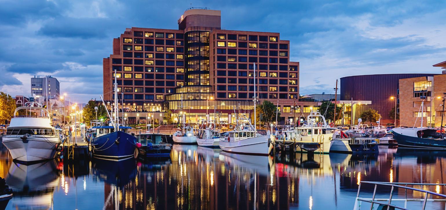 hobart waterfront at sunset iwth boats and buildings