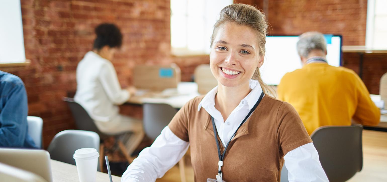 smiling woman in an office