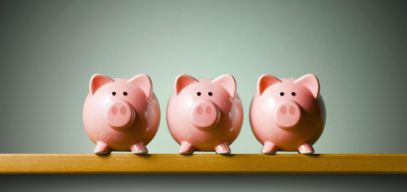 three piggybanks in a row