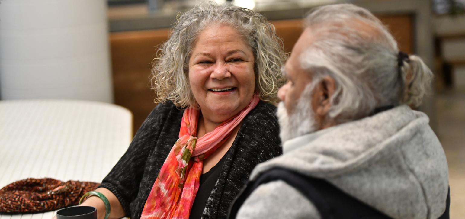 Australian indigenous couple chatting