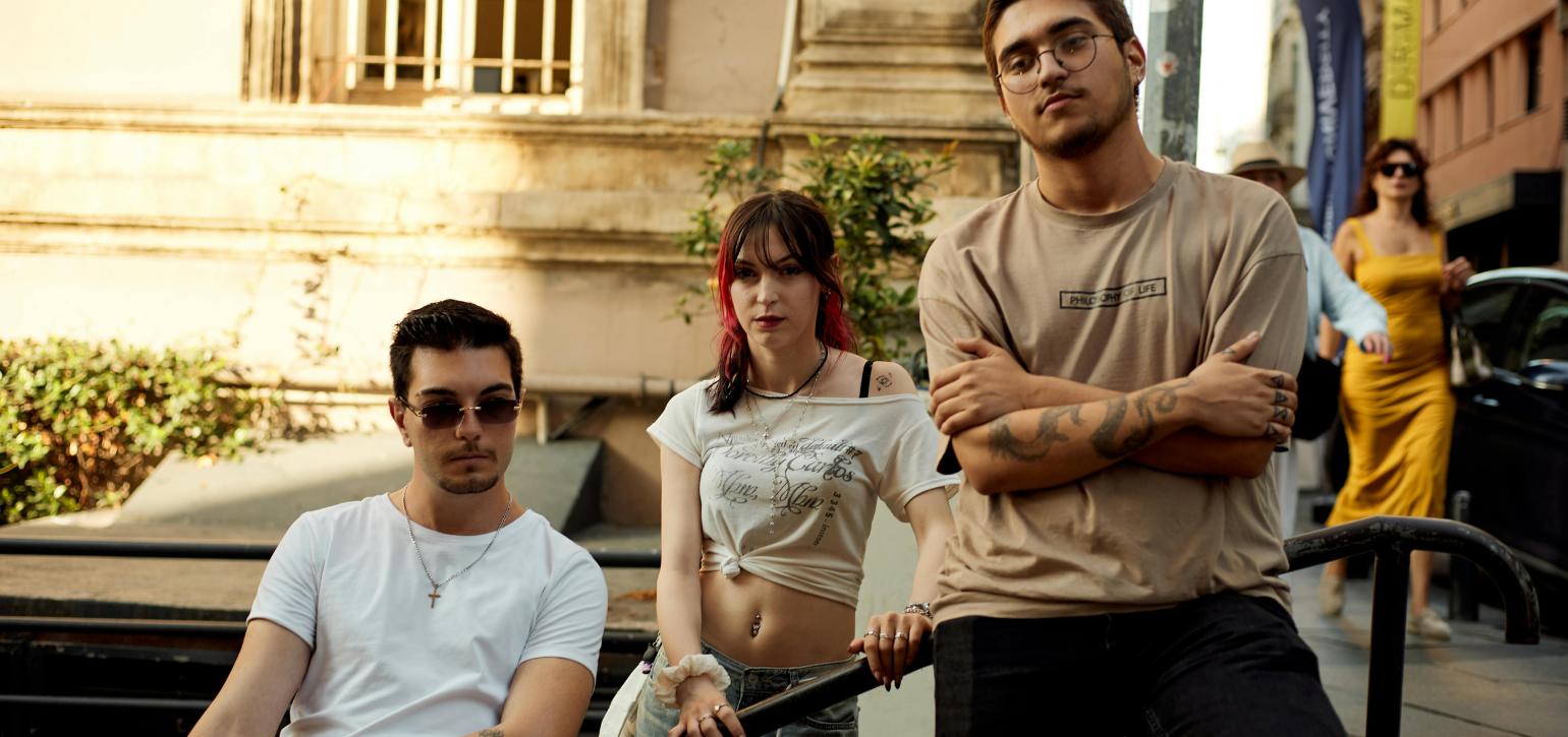 Young people standing on steps