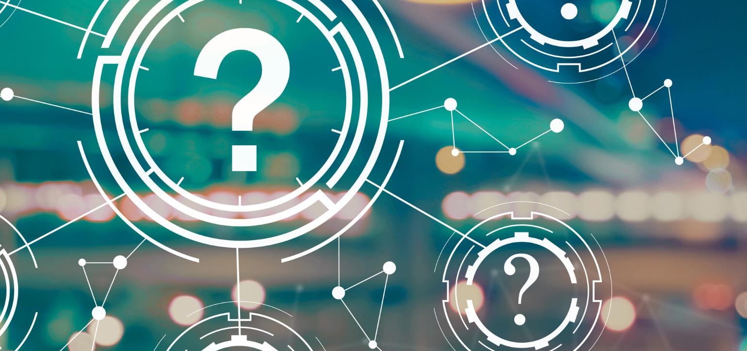 question mark graphics over blurred background