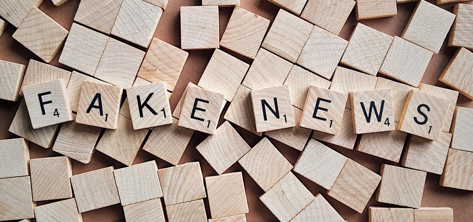 letters spelling out fake news