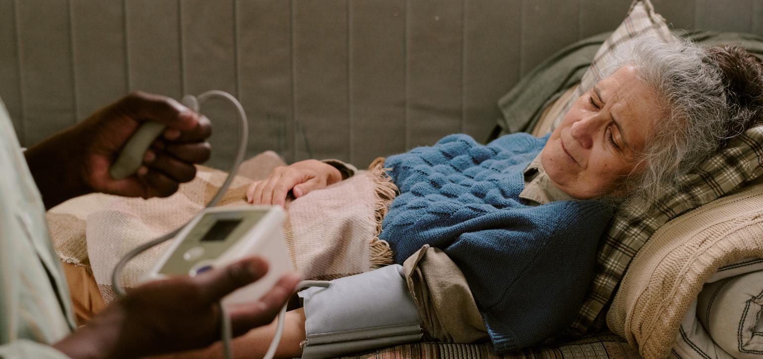 sick woman receiving medical care