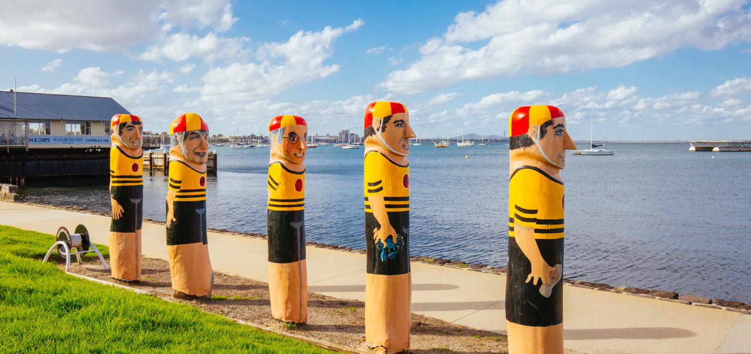Wooden beach figures on Geelong waterfront