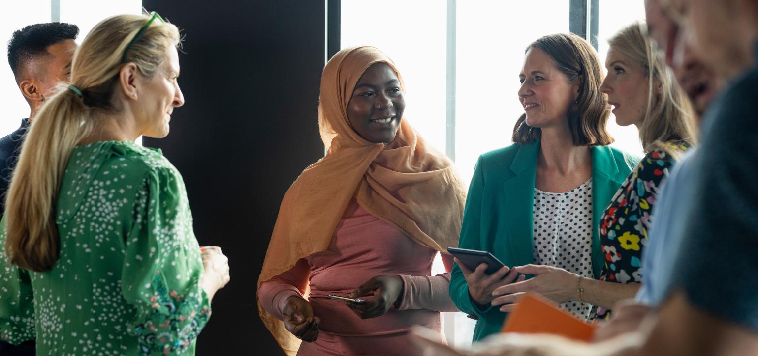 community members talking in a group