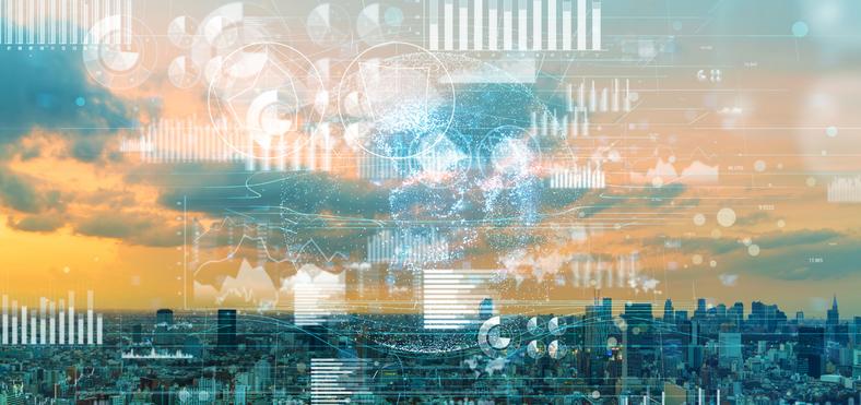 aerial view of city at sunset with data overlay