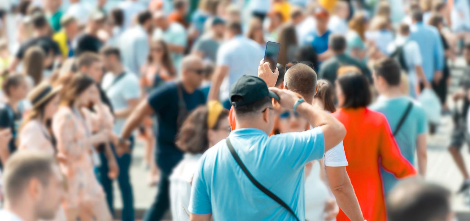 Group of people walking in a crowd