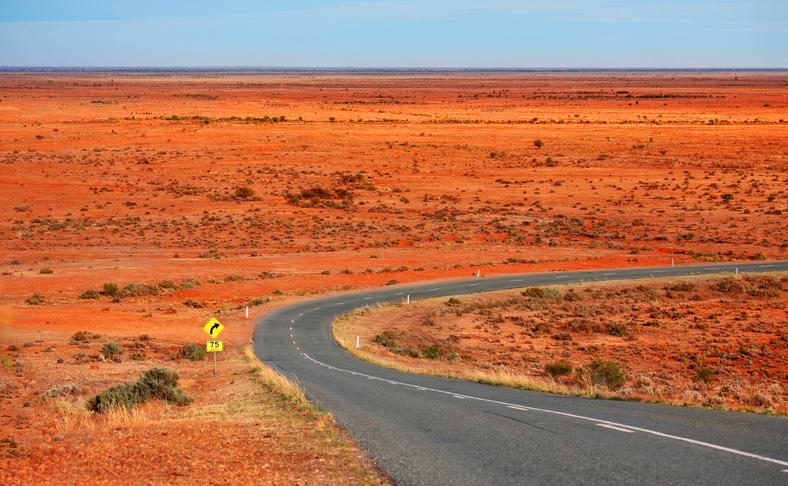 A winding road in the desert